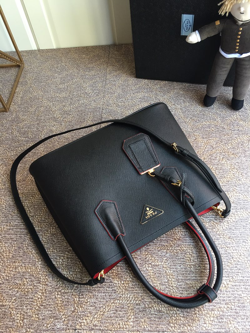 Pra*a top handle bags